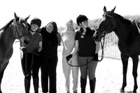 Kate Day's family portrait at the beach with horses